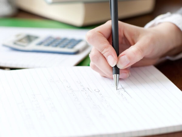 close up of a woman writing