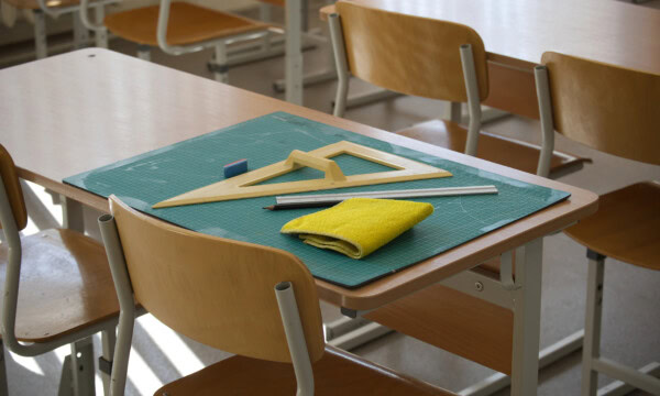 classroom desk showcasing math tools